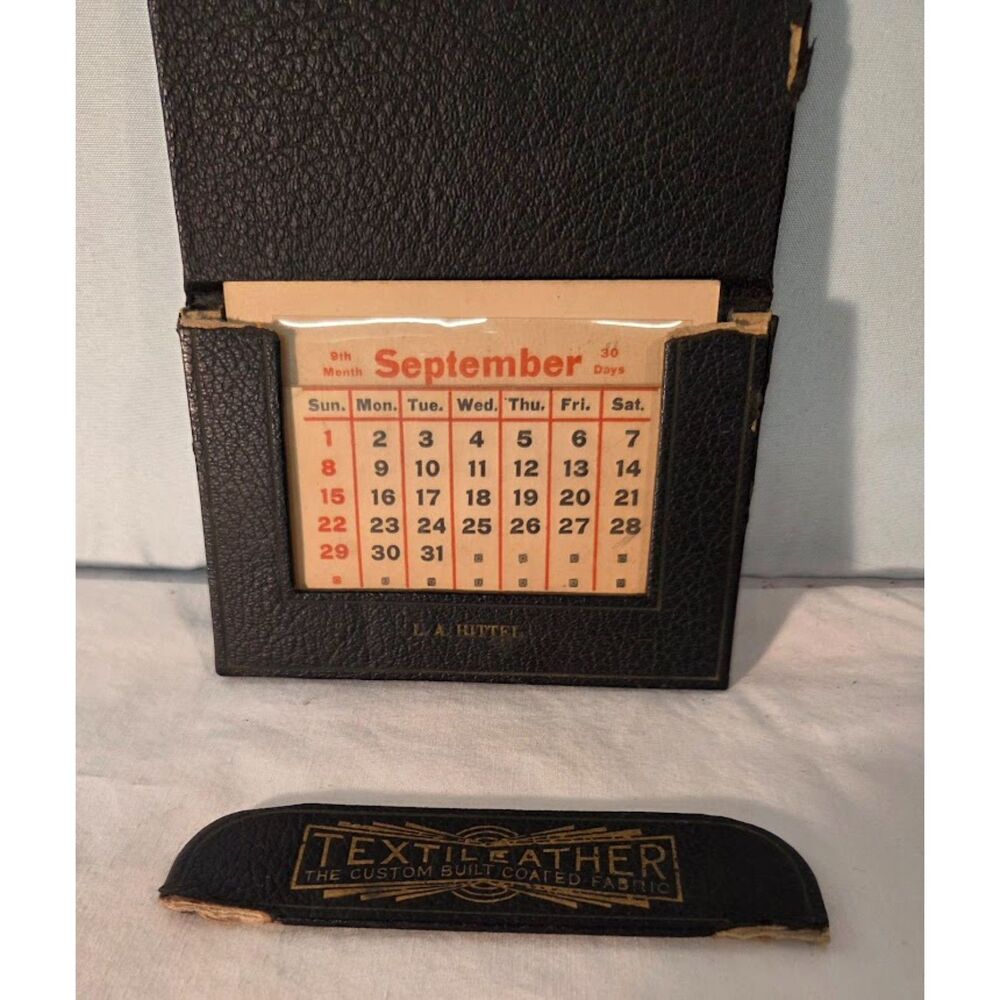 Vintage Textileather Perpetual Desk Calendar Advertising LA Hutter